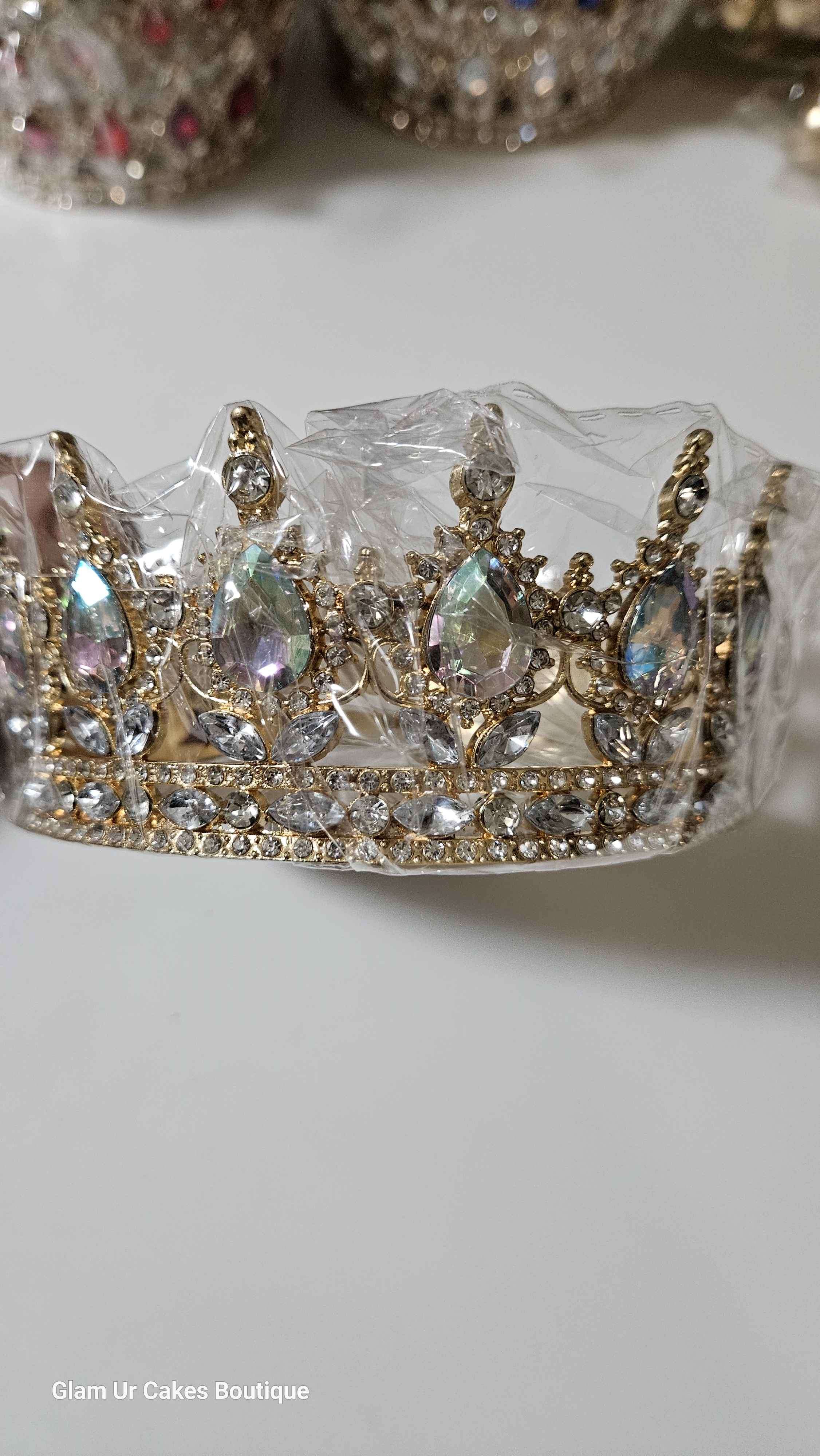 Gold crown with color changing rine stones
