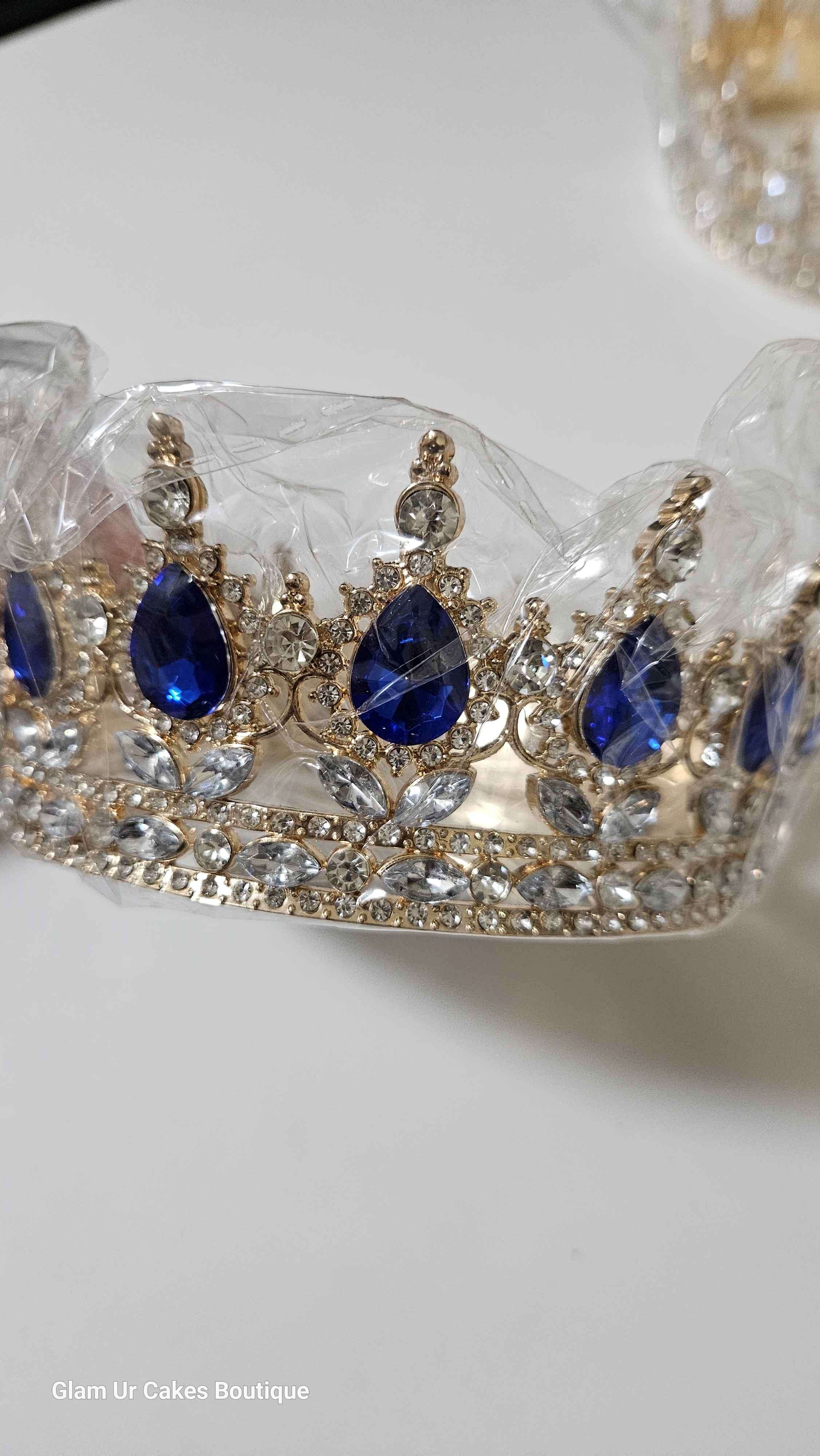 Gold crown with royal blue stones